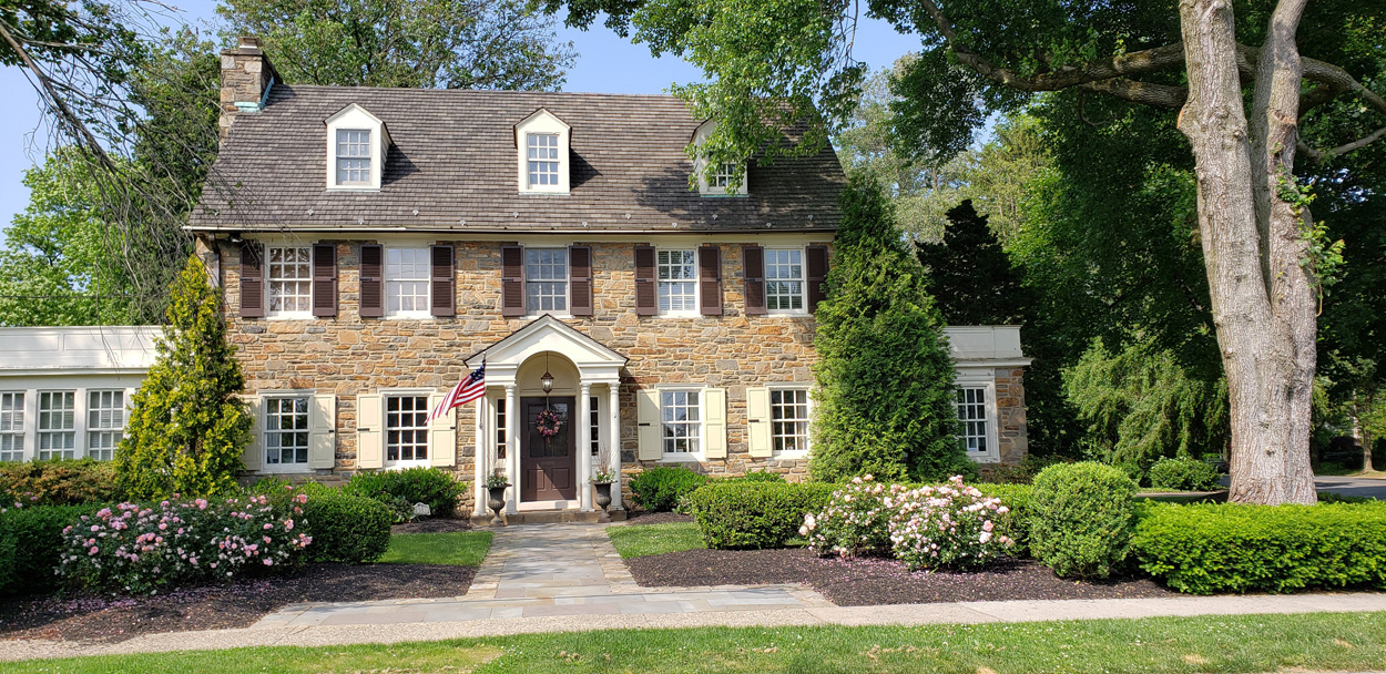 house with an american flag in front