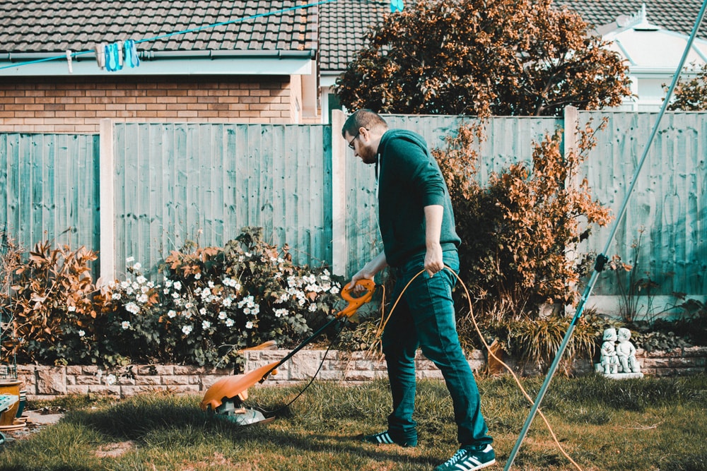 man mowing lawn