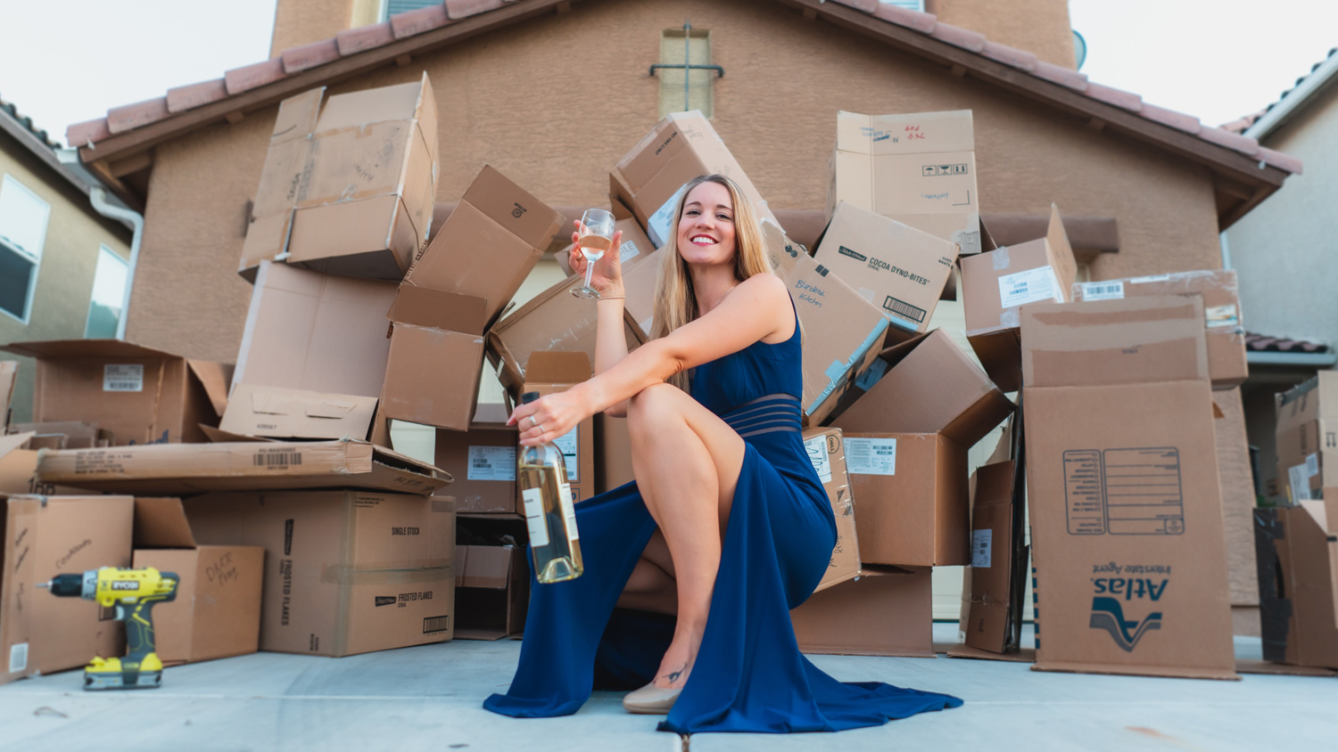 woman sitting outside house